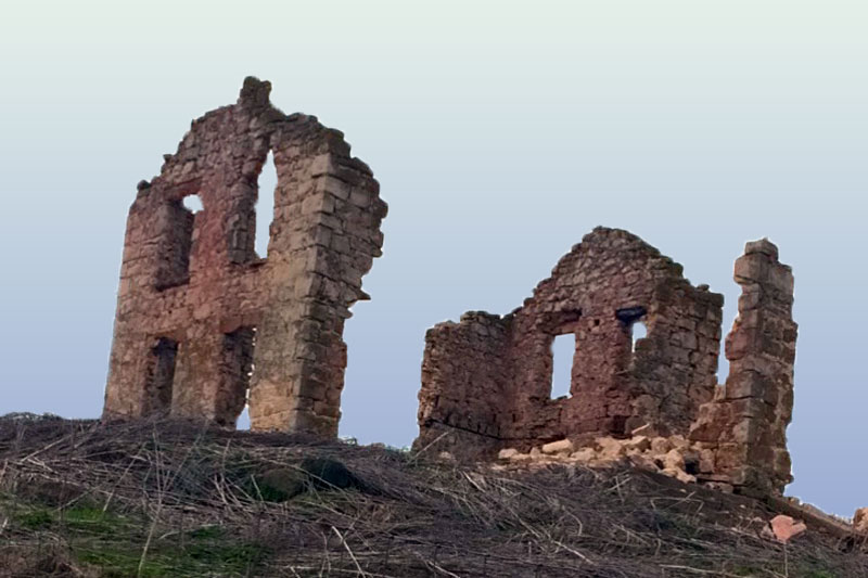 image of old crumbling stone house